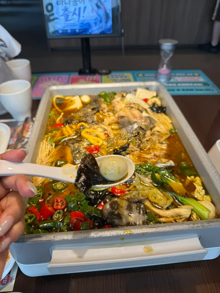 Vegetable-mushroom sides added into the kaoyu broth