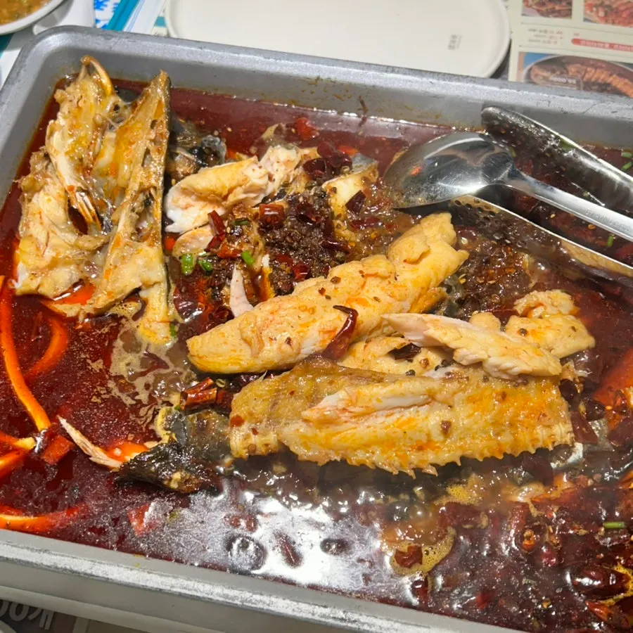 Boneless kaoyu fish flesh plated on top