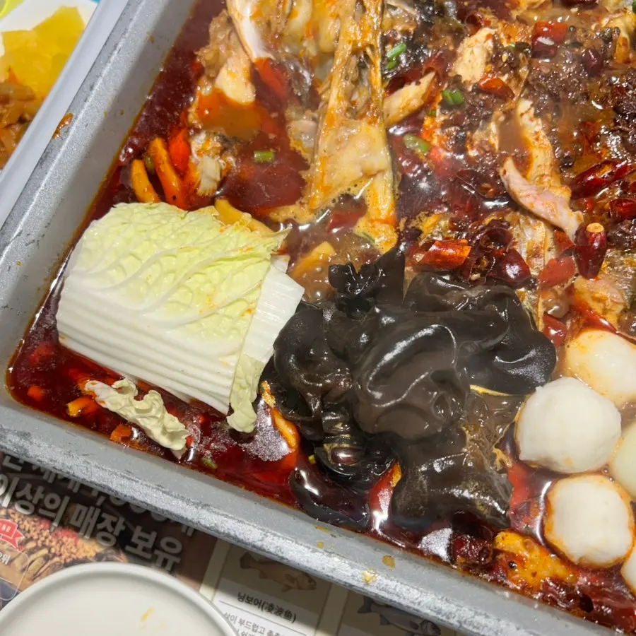 Panda glass noodles and mushrooms simmering in mala broth