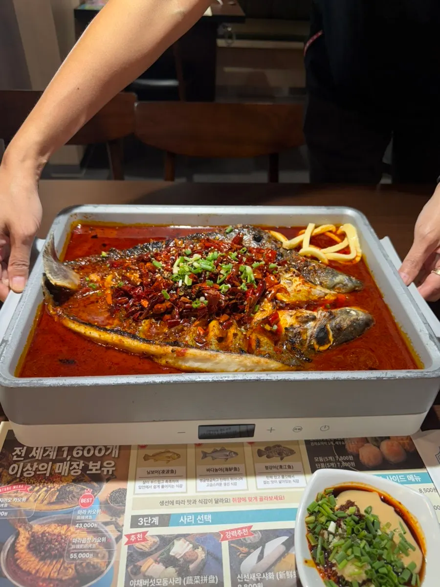 Pot of mala kaoyu with ningbo fish