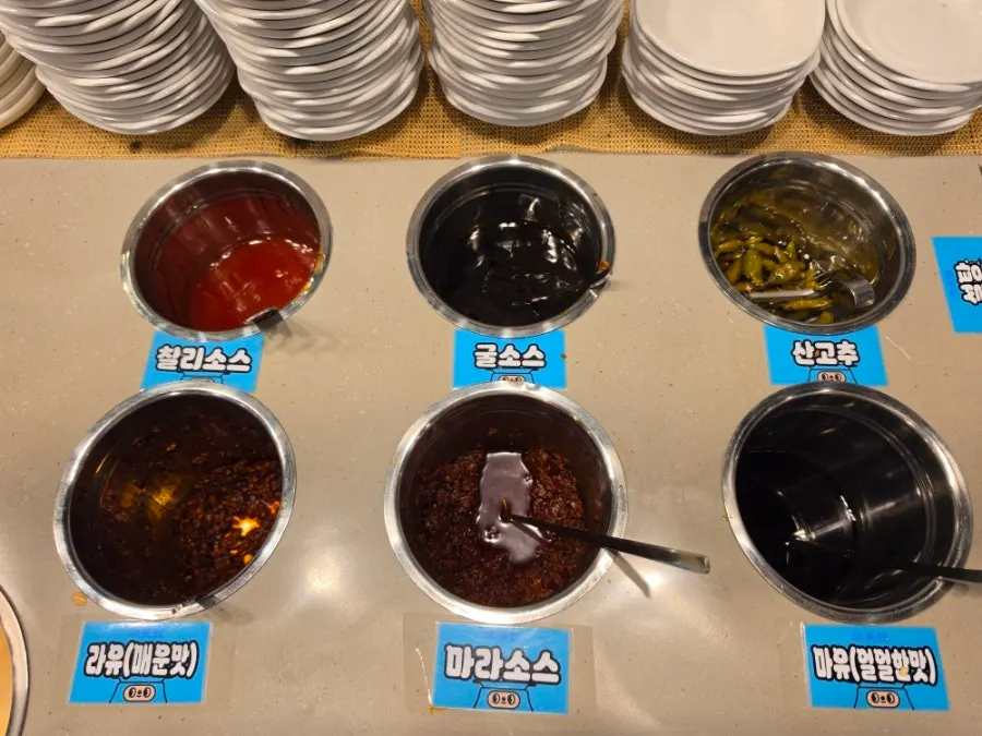Rice, snacks and drinks laid out at the self-serve bar