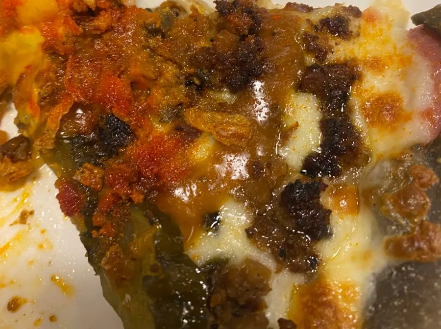 The sausage-stuffed edge crust of the pizza