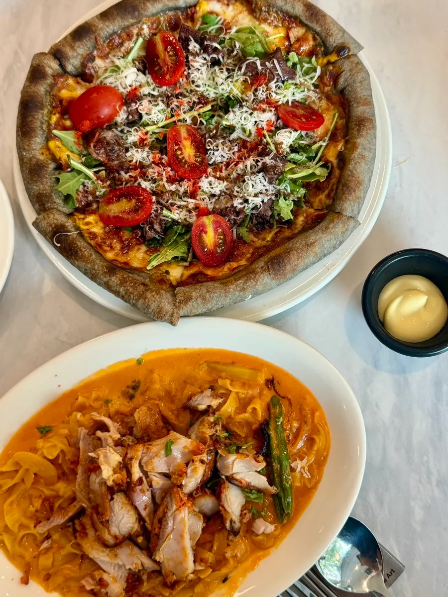 Full view of the fire-grilled chapsteak pizza