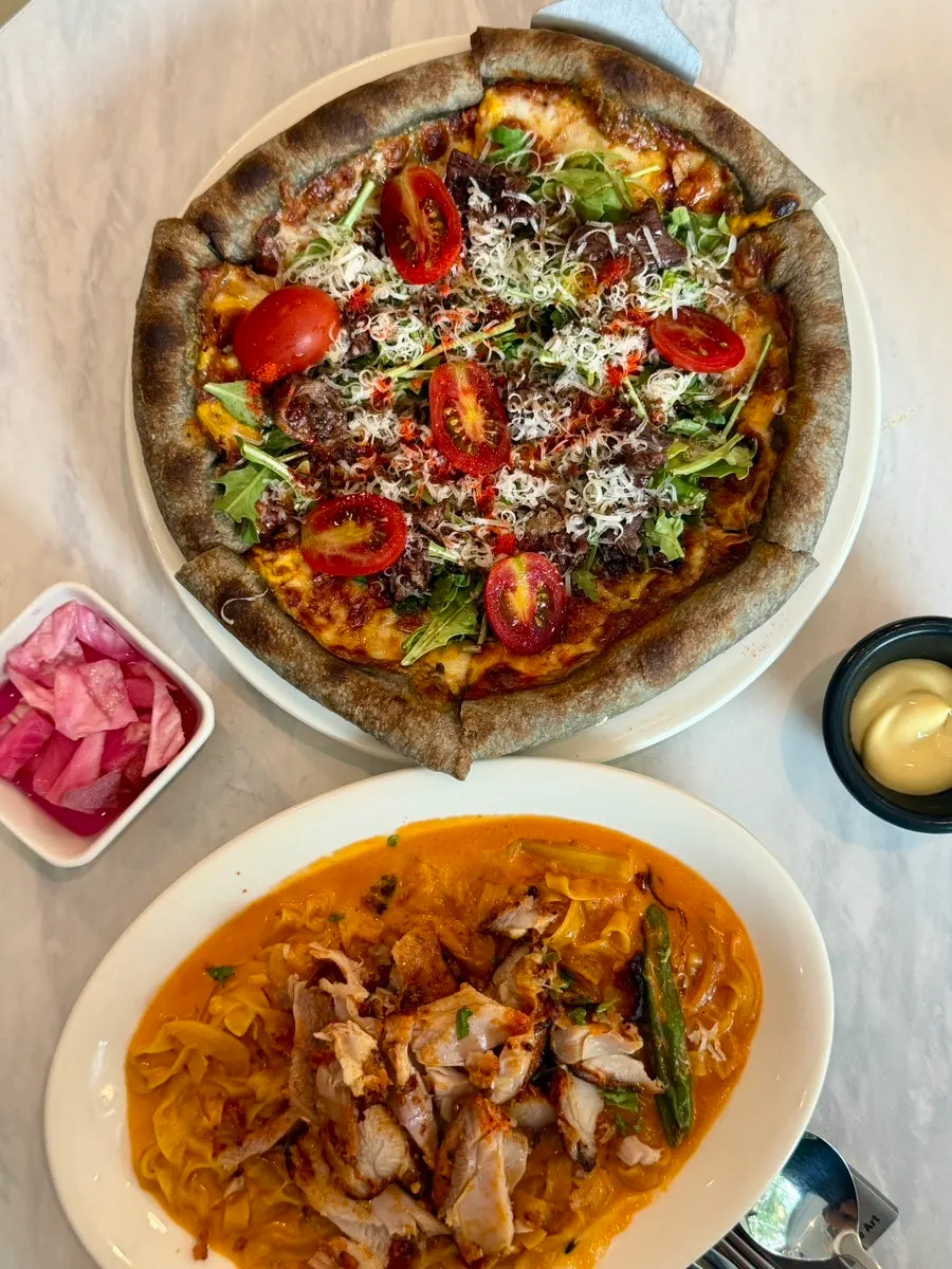 Long-leg fire chicken rosé pasta topped with a whole chicken leg