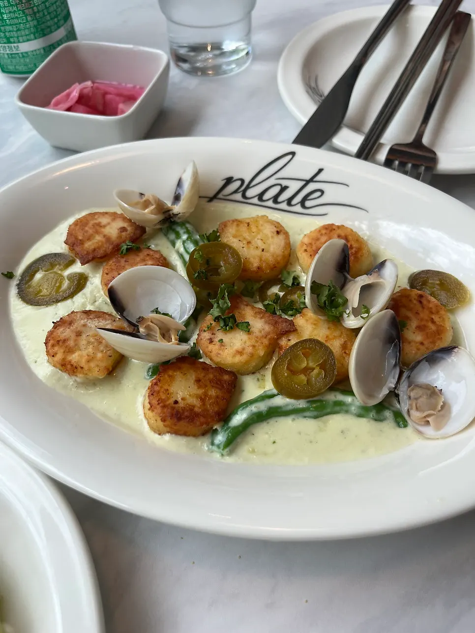 A plate of Chungyang Vongole Cream Gnocchi