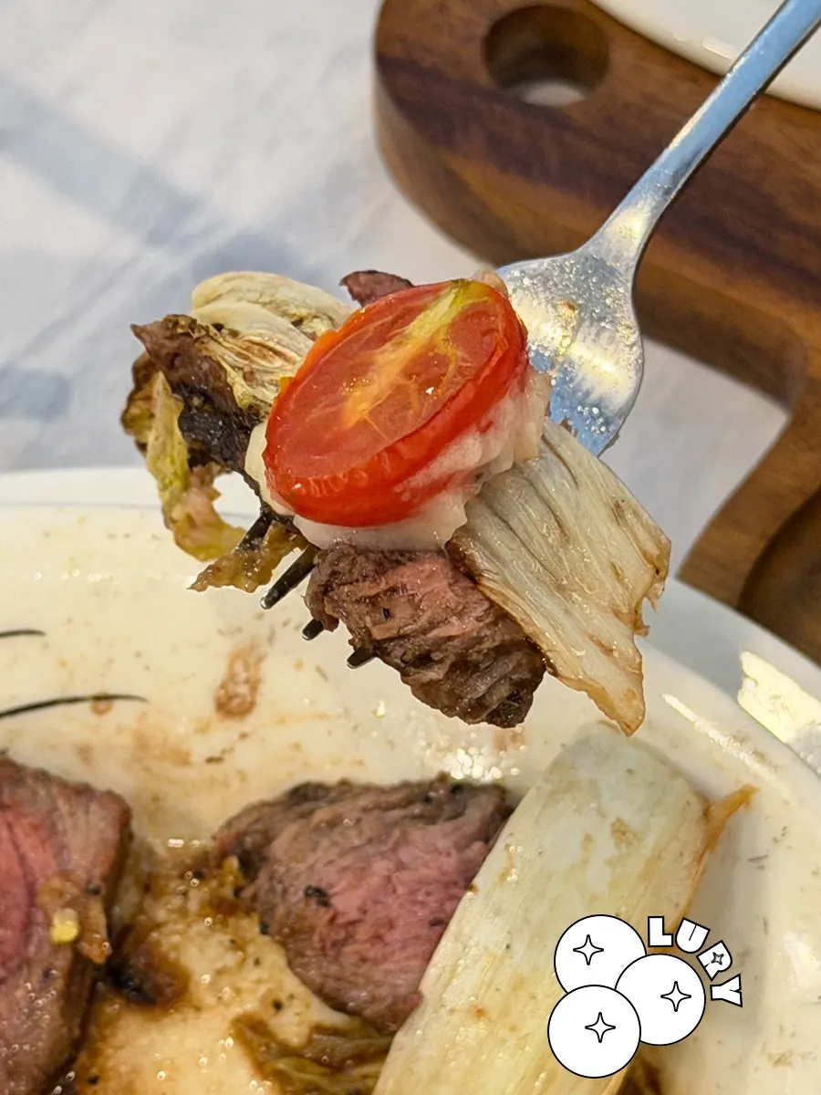Napa cabbage served alongside the steak