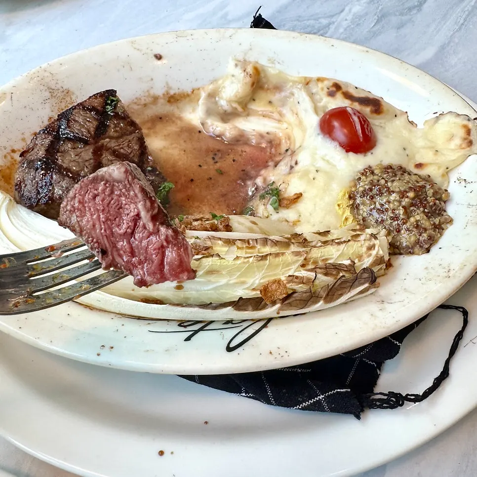 Tender steak served with sauce