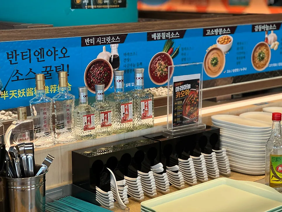Self-service bar with rice and drinks