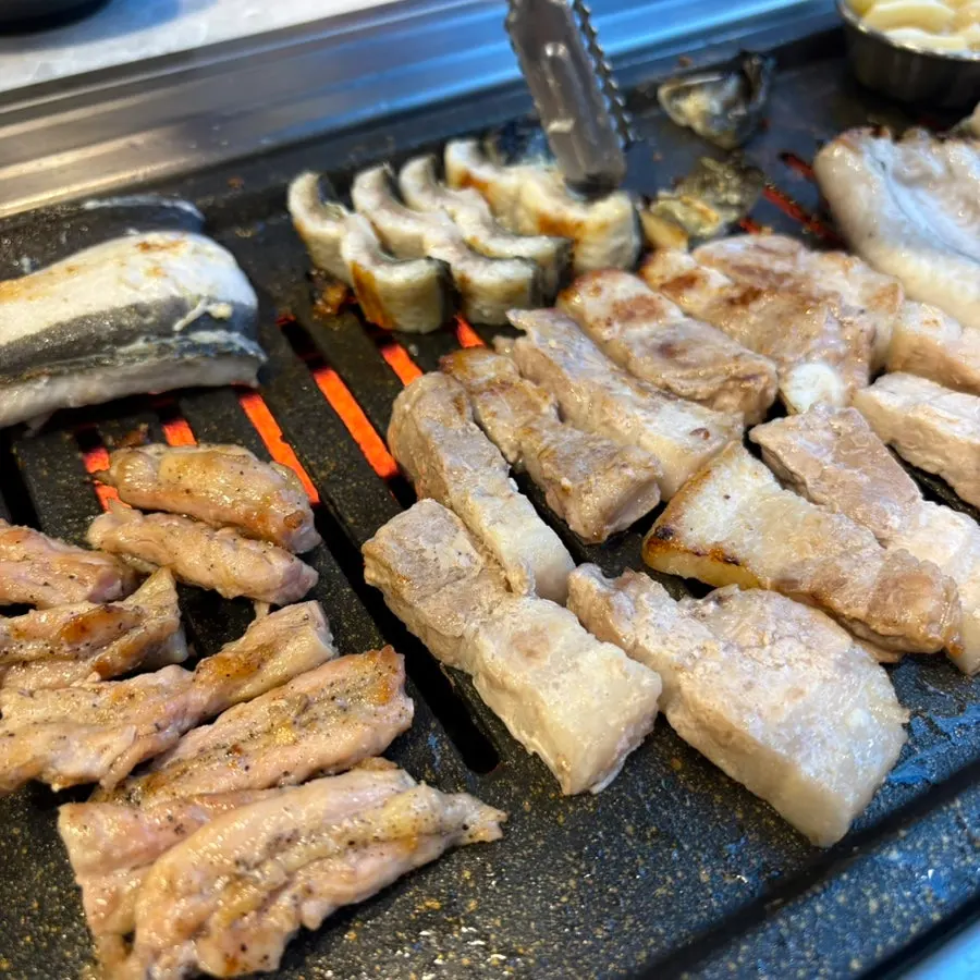 Eel grilling on its cut sides
