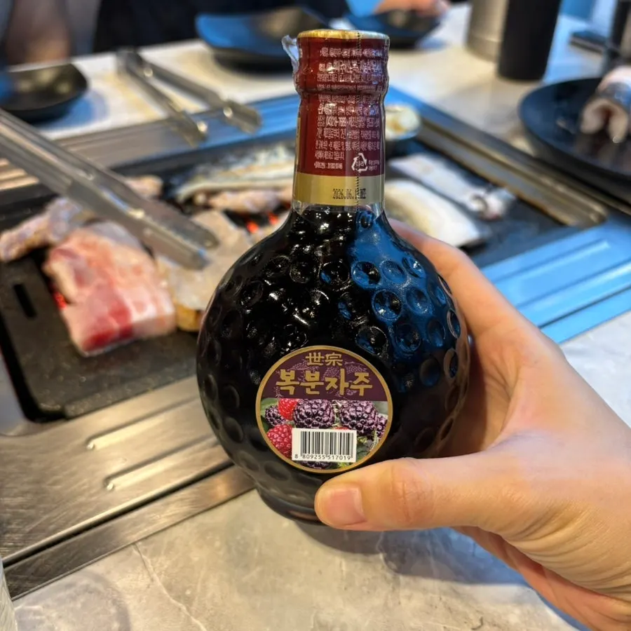 Bokbunja wine served with eel
