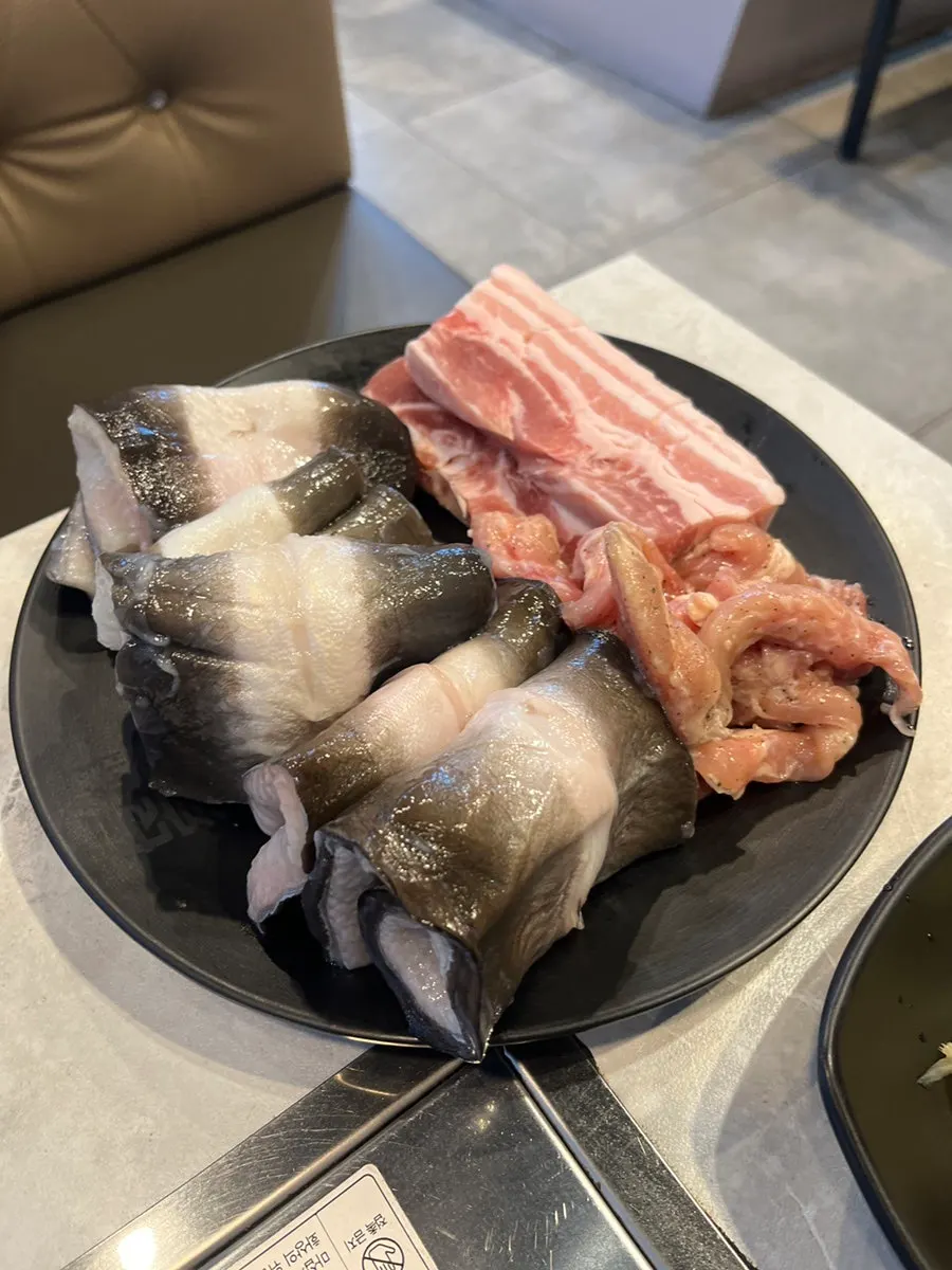 Self-service bar with eel, pork belly, and chicken neck meat