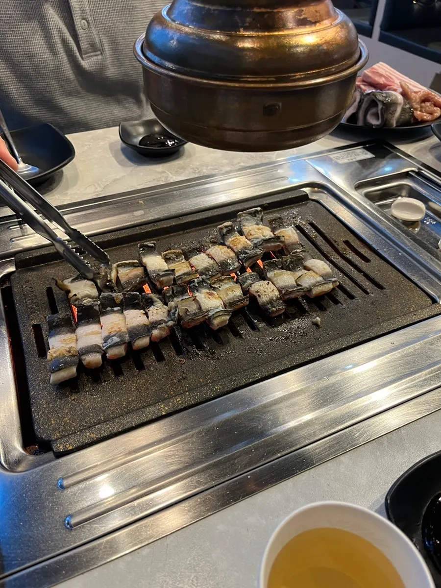 First platter of eel, pork belly, and chicken neck meat