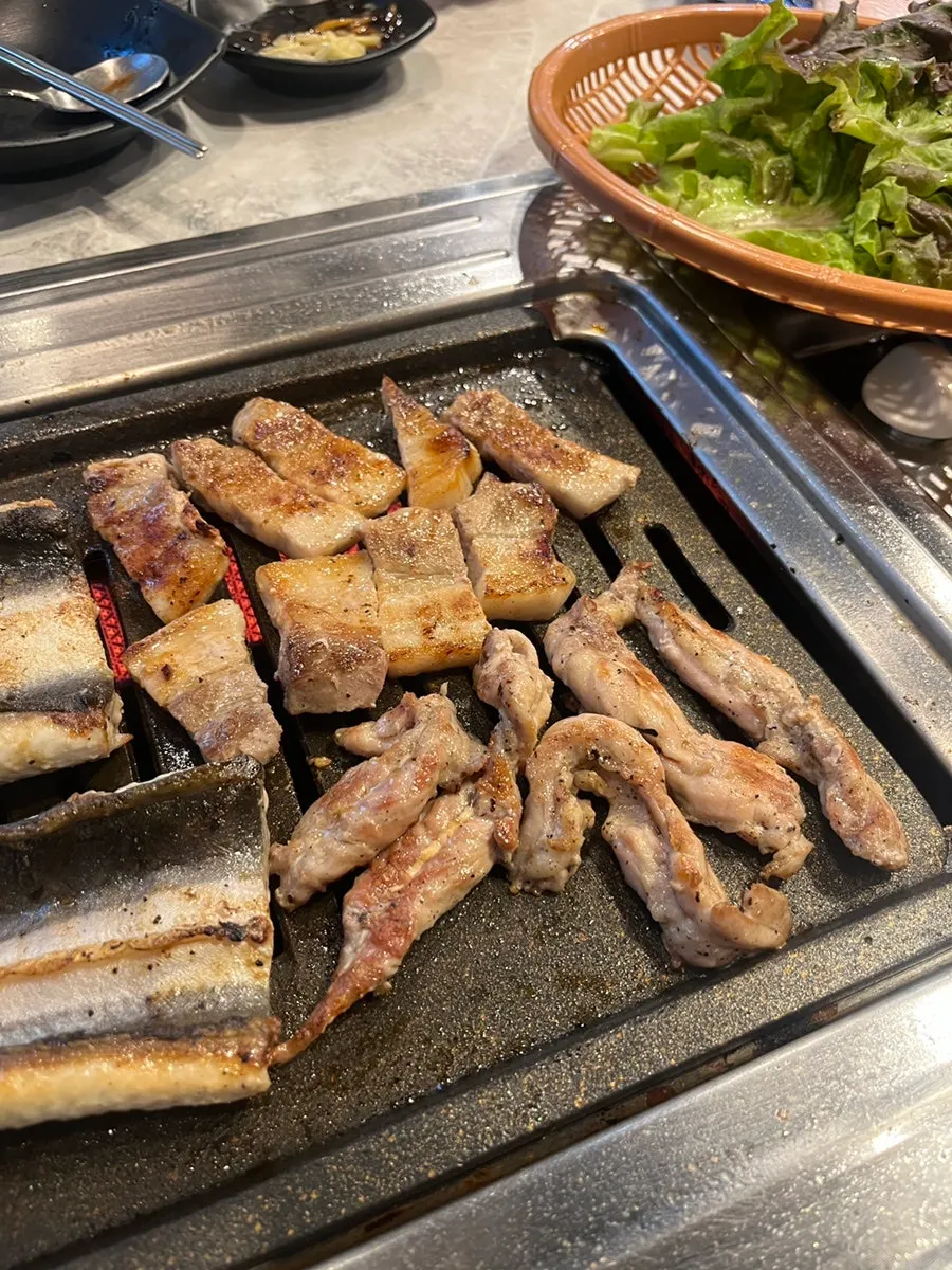 Grilled eel, pork belly, and chicken neck meat