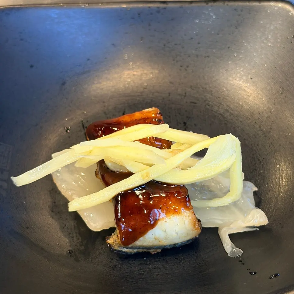 A piece of eel with ginger