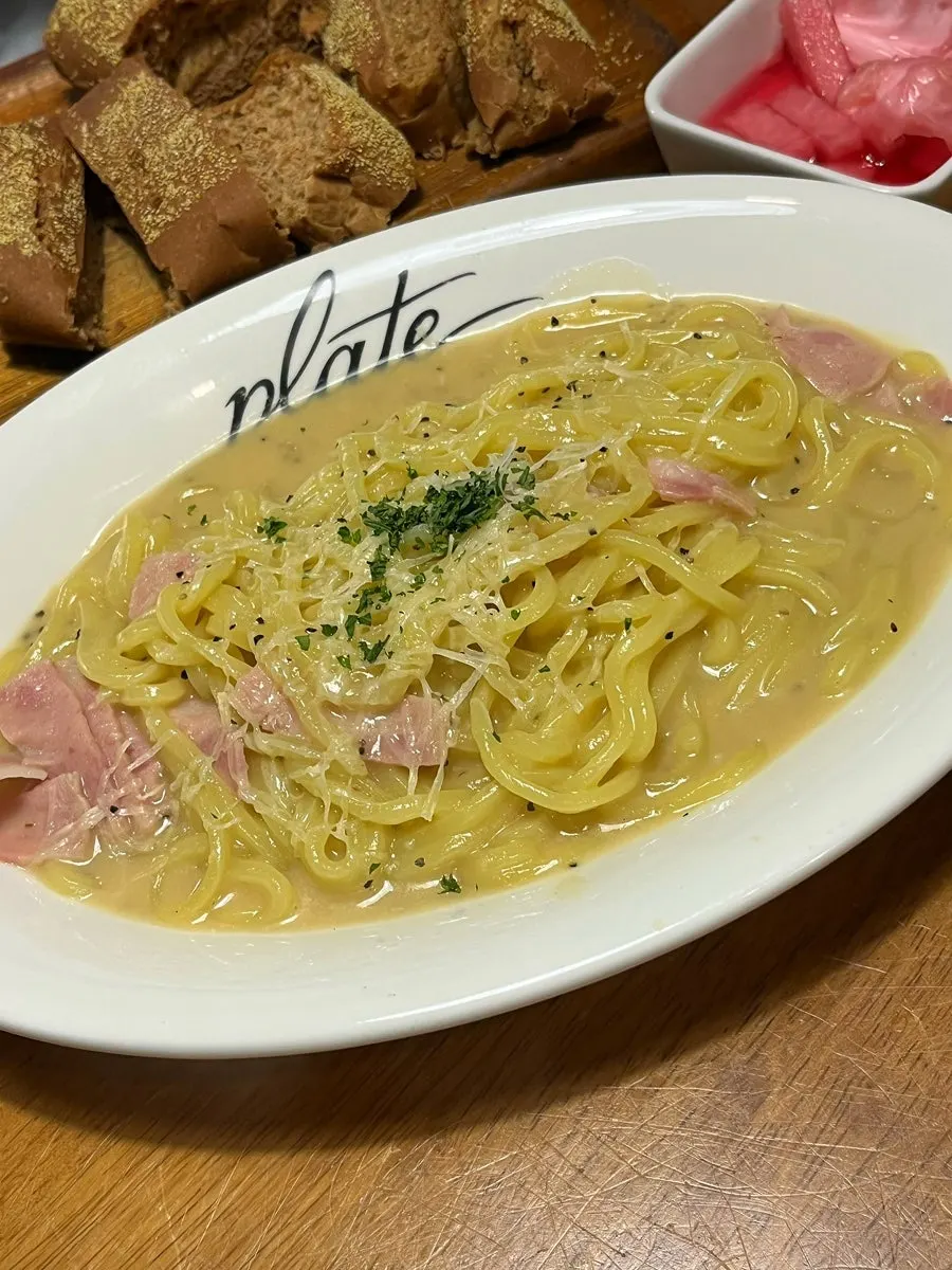 Bacon cacio e pepe with peach noodles