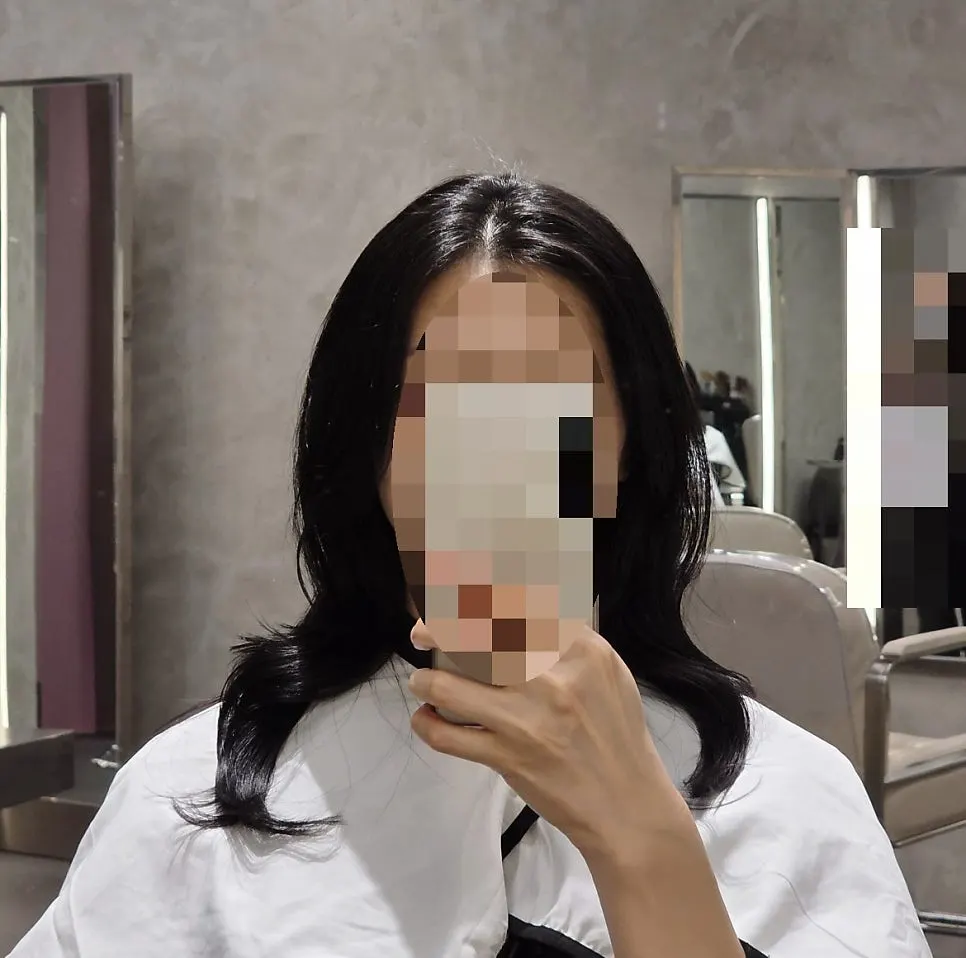 Result showing the black dye held after the setting perm
