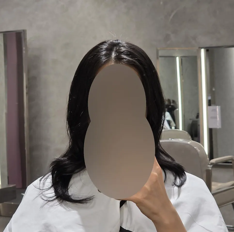 Close-up of hair condition improved after the perm