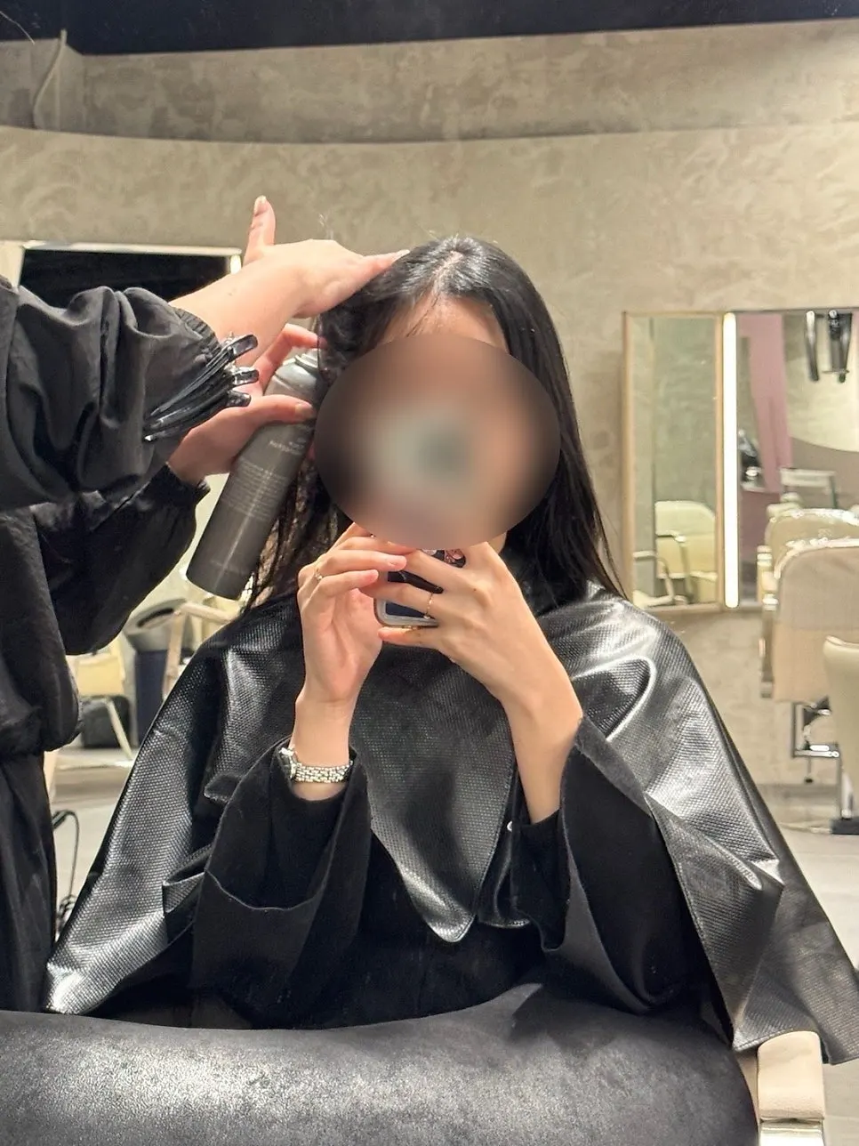 Scalp protectant being sprayed on before dyeing
