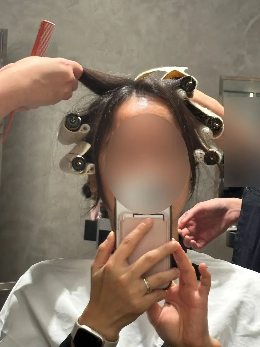 Checking hair condition mid-treatment