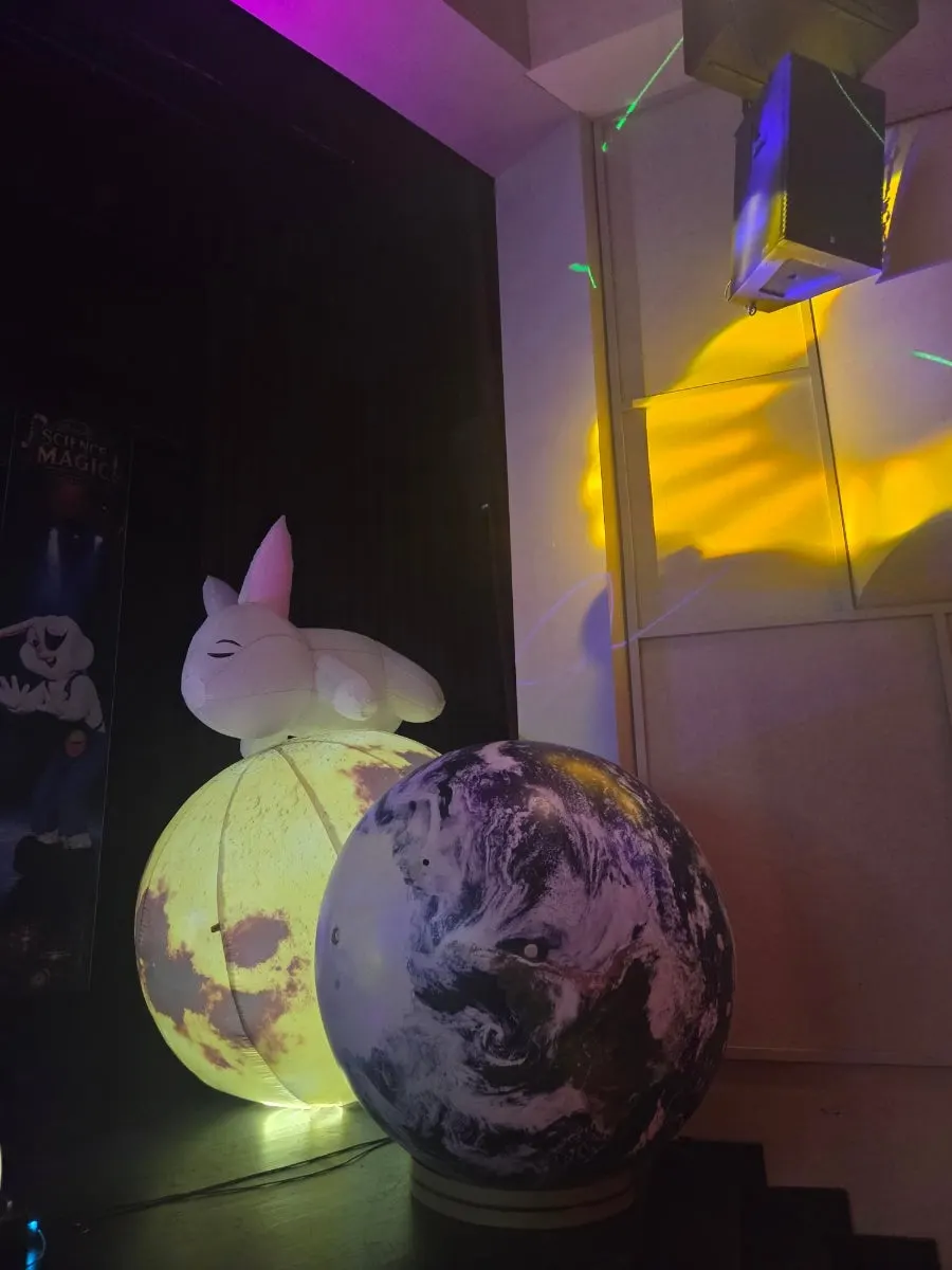 Stage setup with moon and Earth models
