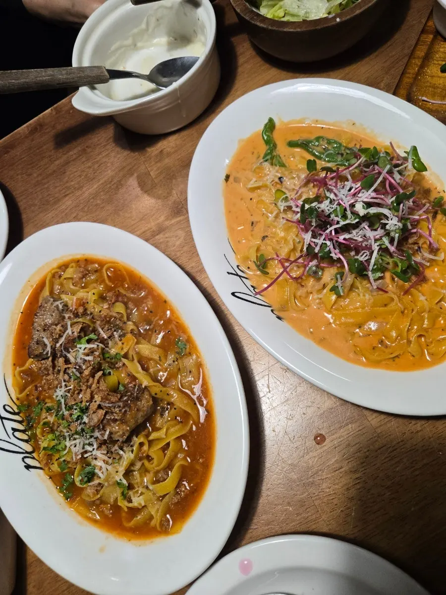 Salad enjoyed between bites of pasta