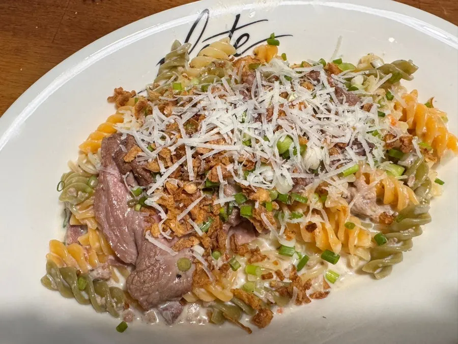 A plate of Plate's steak cream ragù pasta