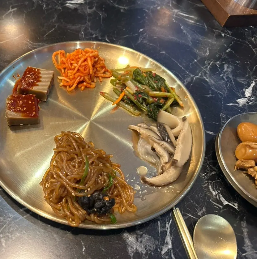 Banchan plate including braised quail eggs