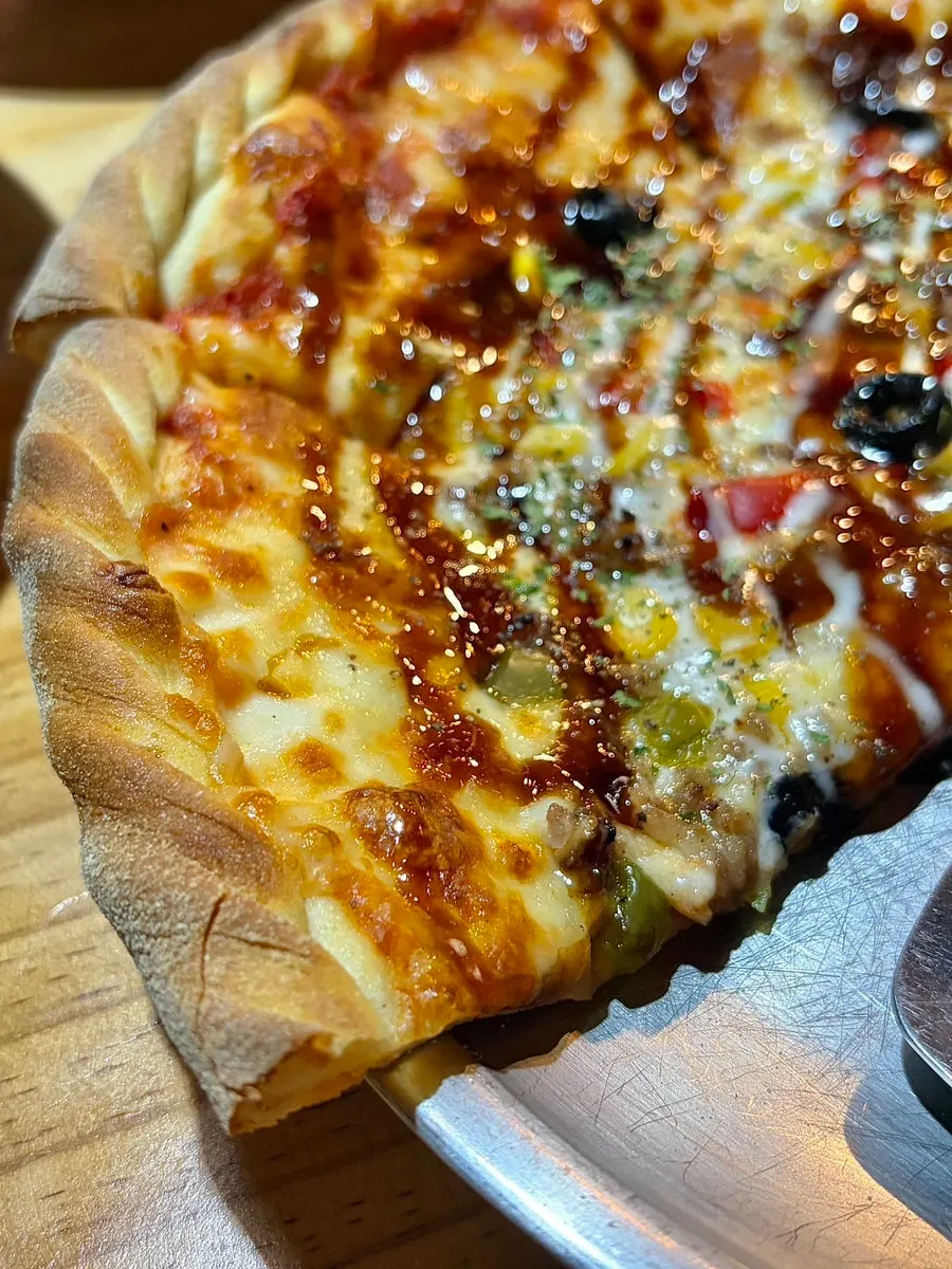 Meal spread before eating bulgogi pizza