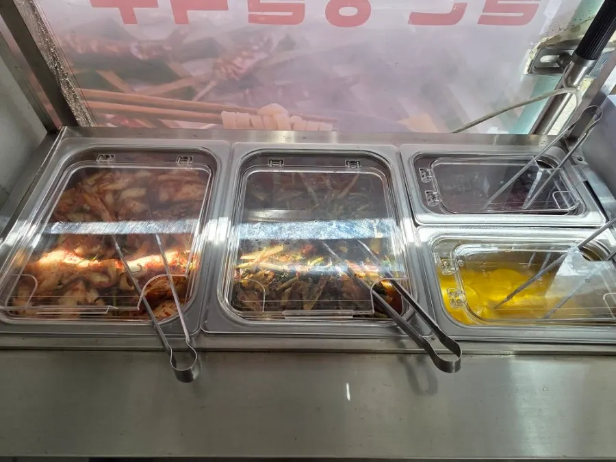 Self-serve corner side dishes and pickled radish container
