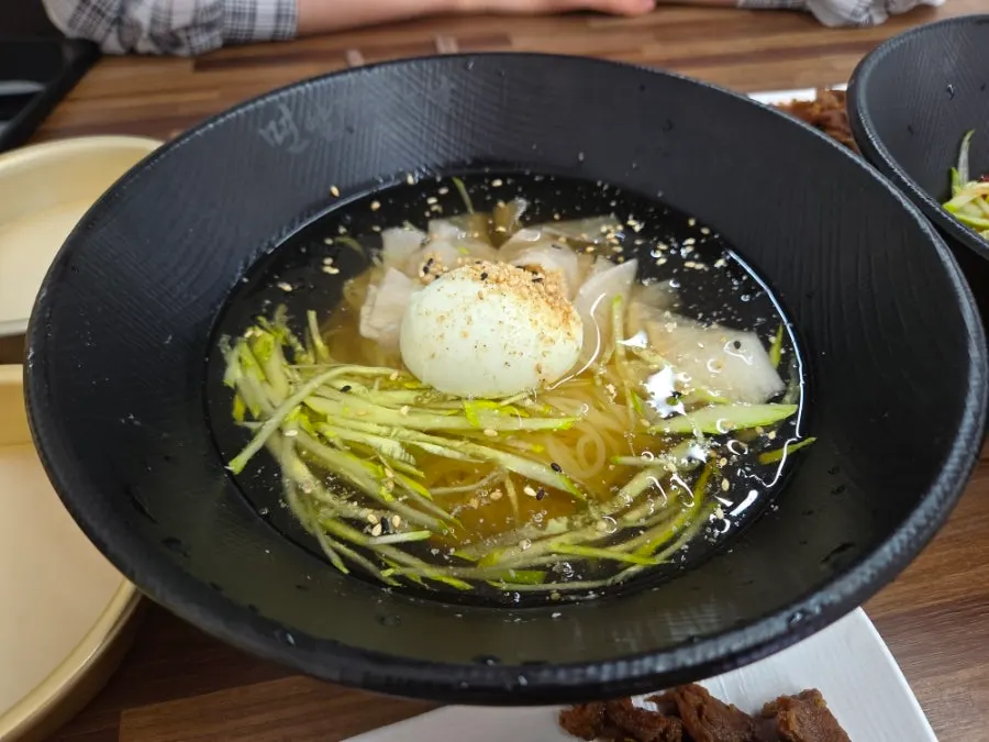 A bowl of water milmyeon in cool broth
