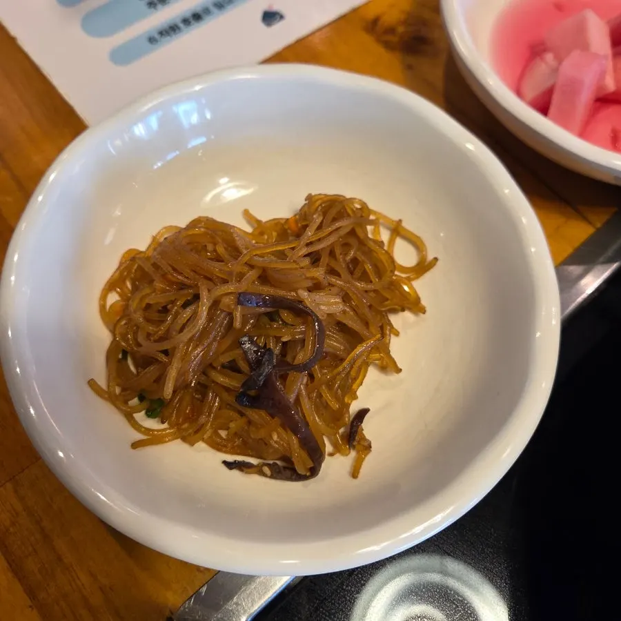 Spread of side dishes served after ordering