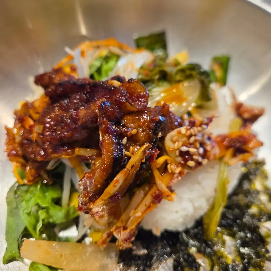 Close-up of a piece of fire-grilled pork stir-fry
