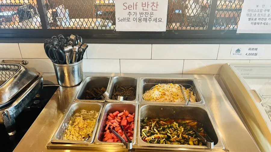 Various side dishes at the self-serve corner