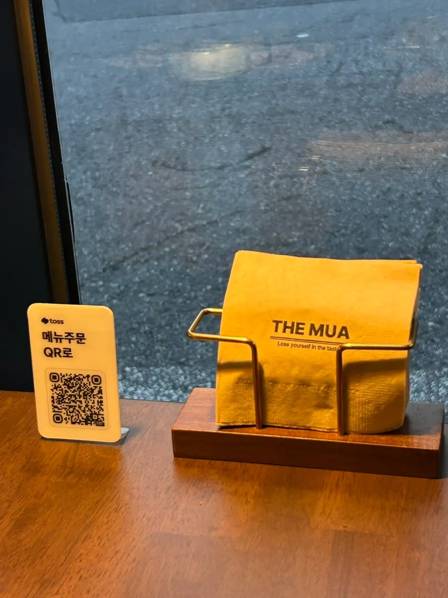 QR code ordering sign at THE MUA