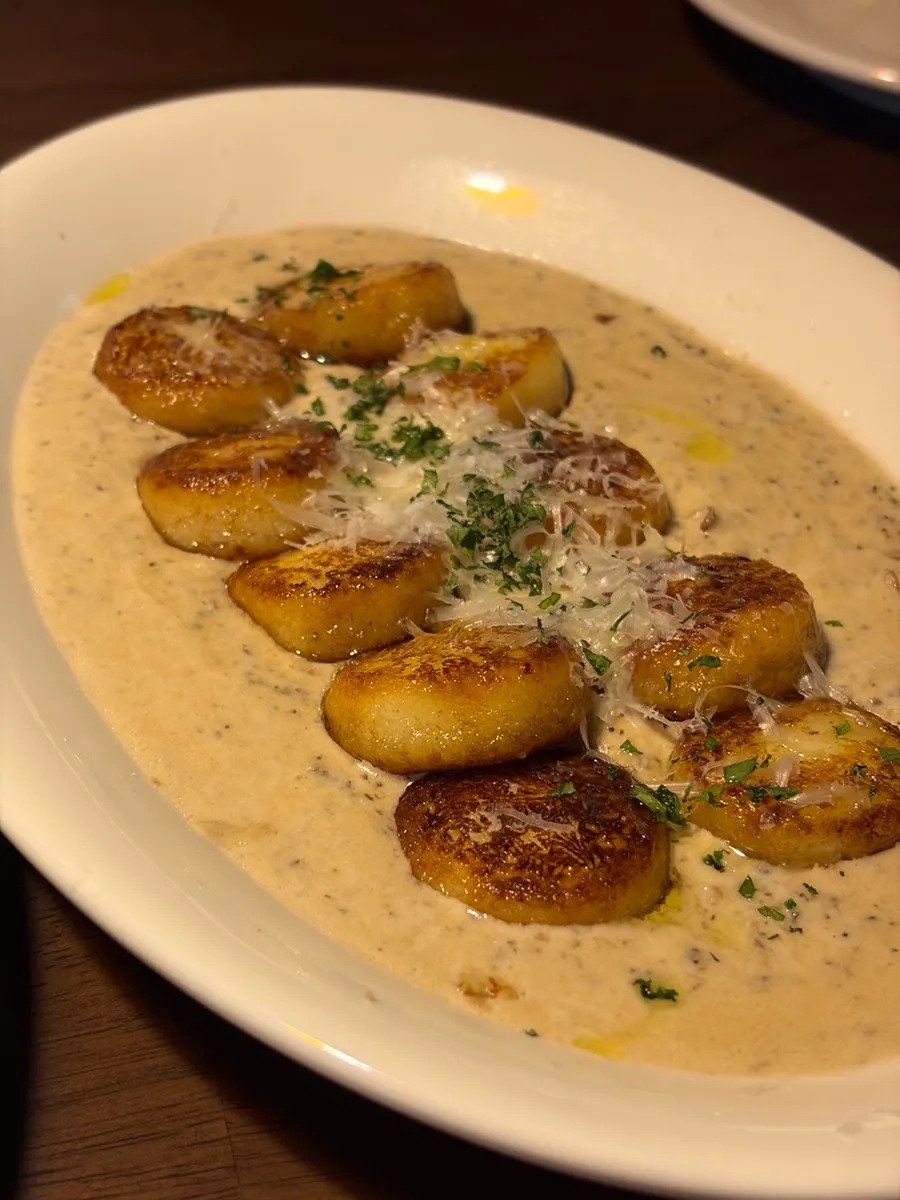 Golden-brown baked quattro mushroom gnocchi