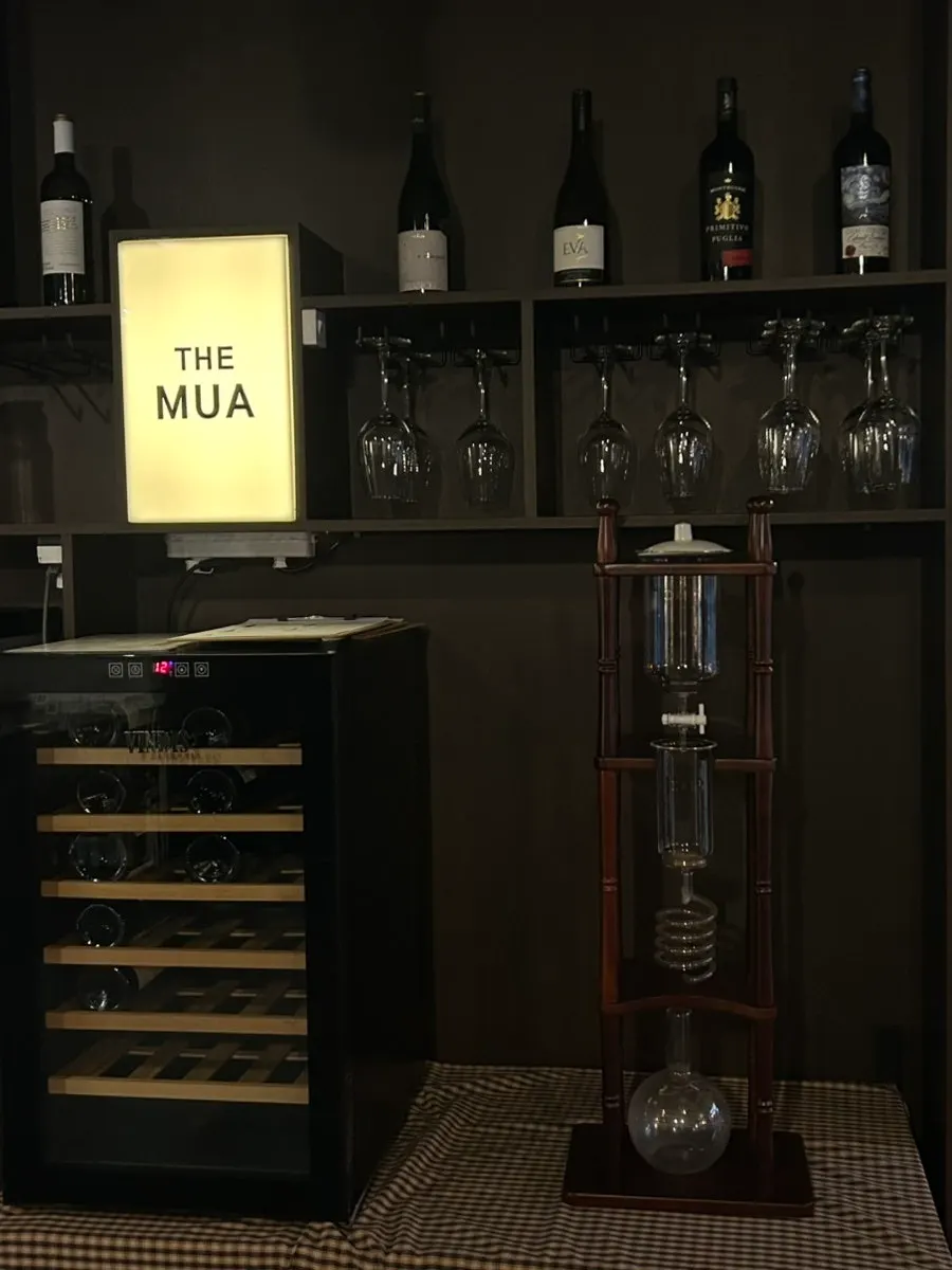 Sign explaining THE MUA's corkage policy