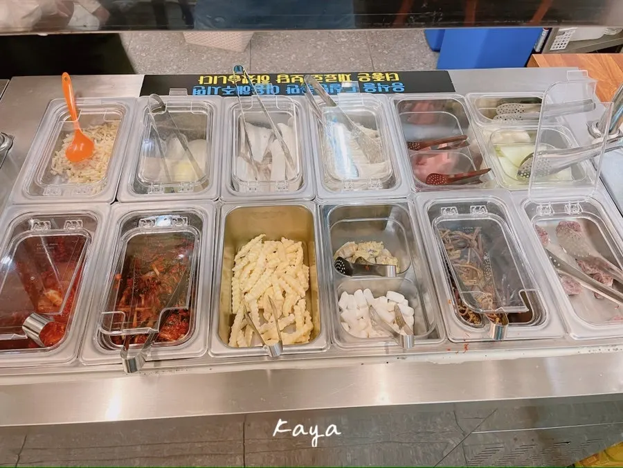 Self-service bar with vegetables and sauces