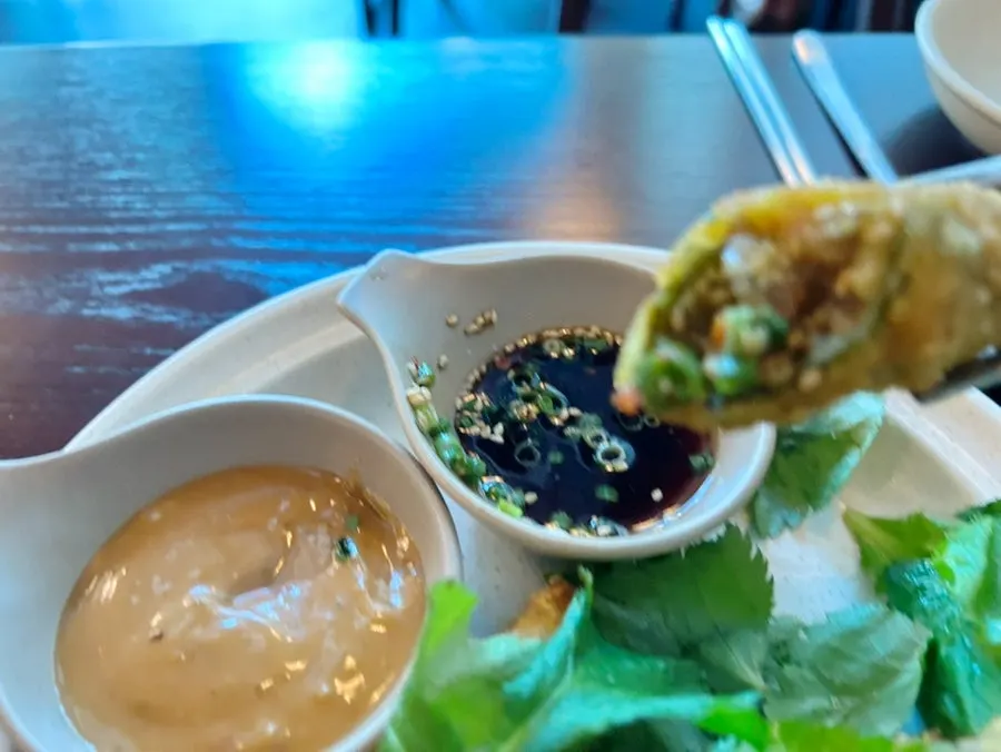 Crispy fried peppers served with dangwi leaves
