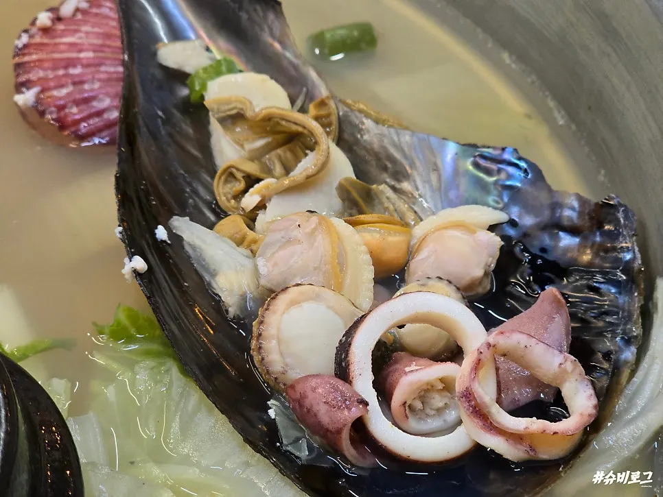Composición de marisco de la olla de almejas