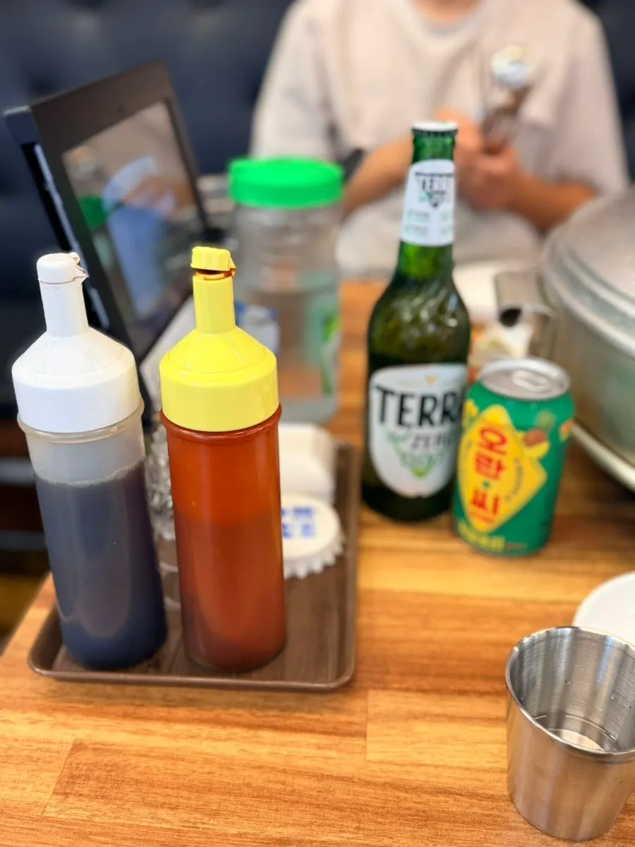 Table being set up for the ordered clam hot pot