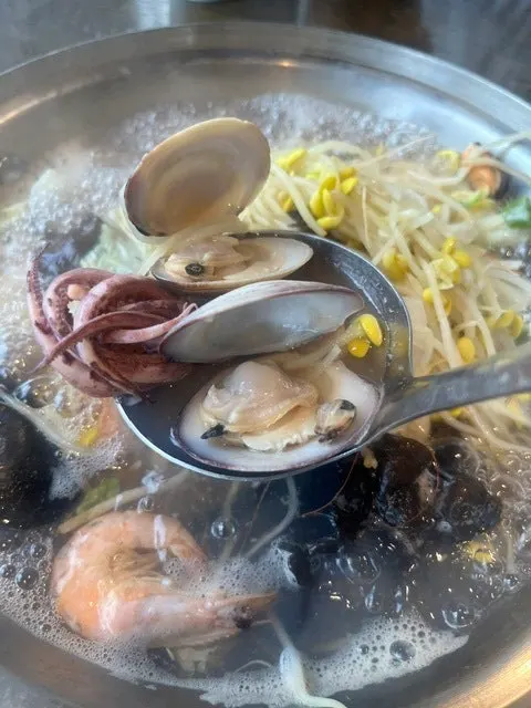 Kalguksu noodles added after the broth had fully infused