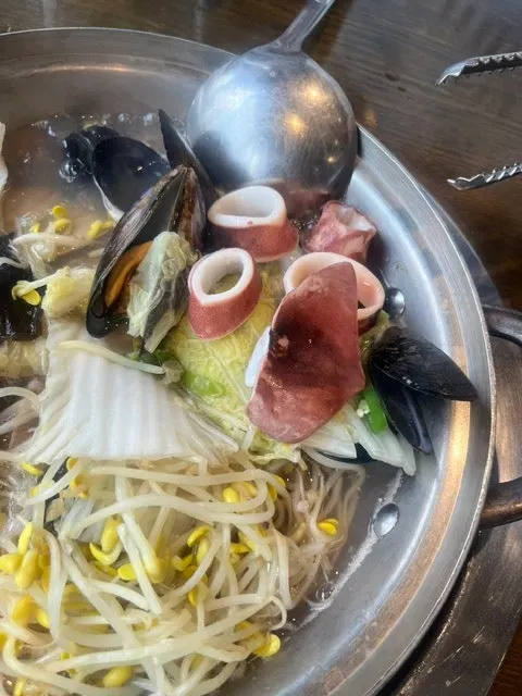 Finishing off the seafood kalguksu as a hangover cure