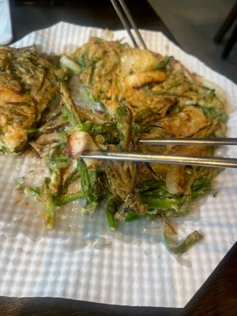 A plate of tasting-size seafood pajeon