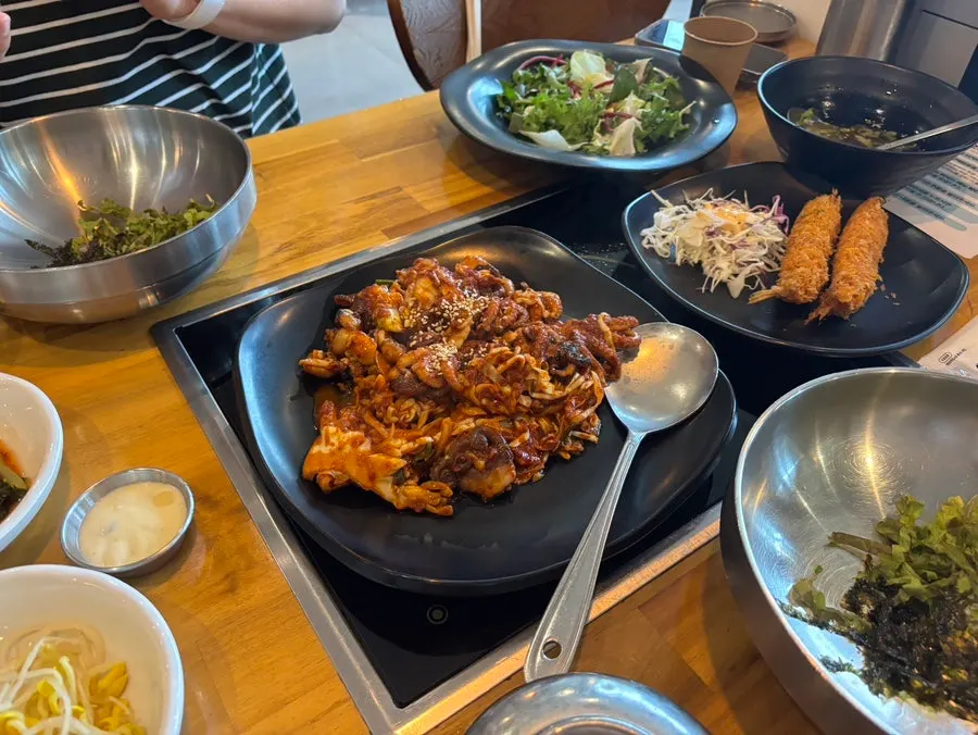 Octopus stir-fry served with a bowl of rice