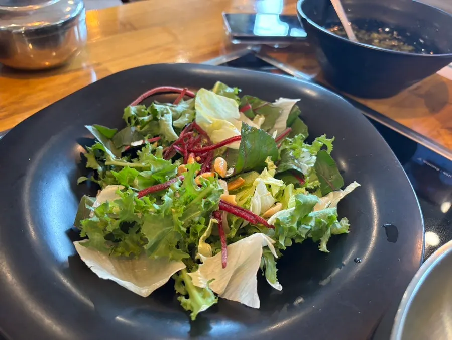 House-made wood-fired pizza included in the set