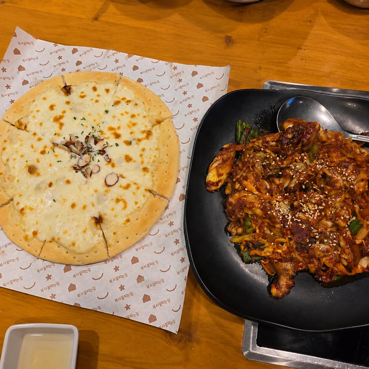 Fire-grilled octopus stir-fry and large mixing bowl