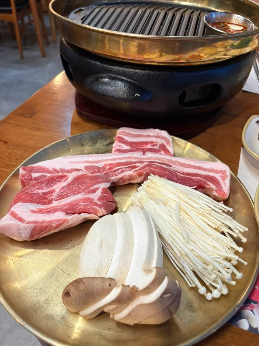 Two servings of Berkshire K pork belly and one serving of pork neck