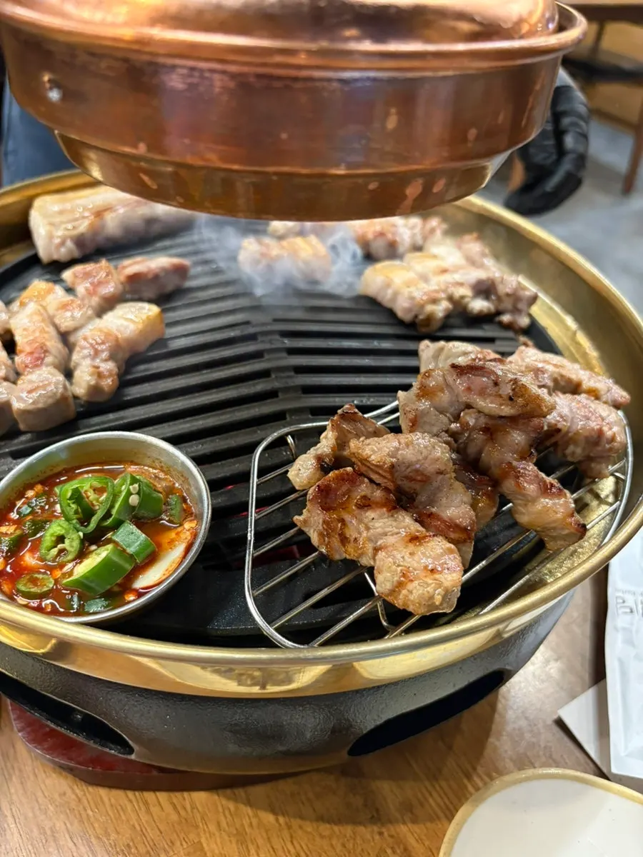 Meat spread served with myeoljeot (salted anchovy sauce)