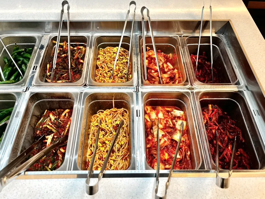 Large self bar with kimchi and wrap vegetables
