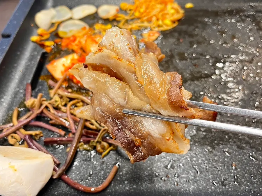Thin-cut pork belly grilled crispy outside and juicy inside